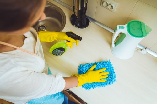Office cleaner in Chelsea maintaining a workspace